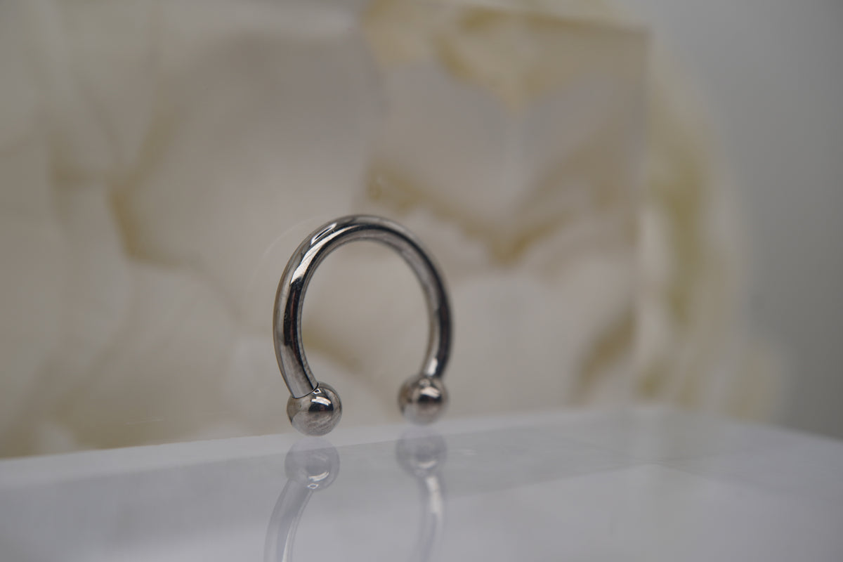 Implant Grade, Hand Polished Titanium 14g Circular Barbell Ring.
