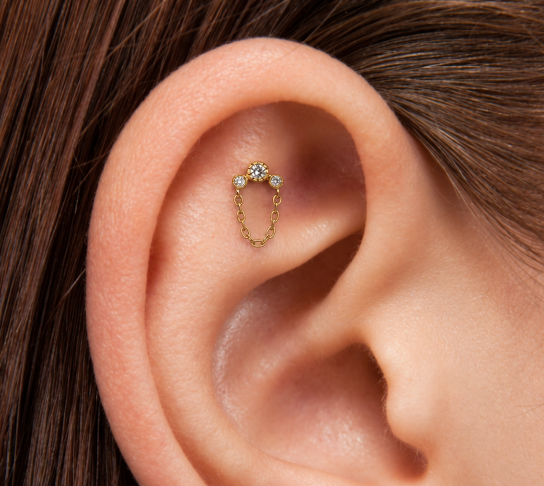 Buddha jewelry 14k yellow gold Halston in a flat piercing