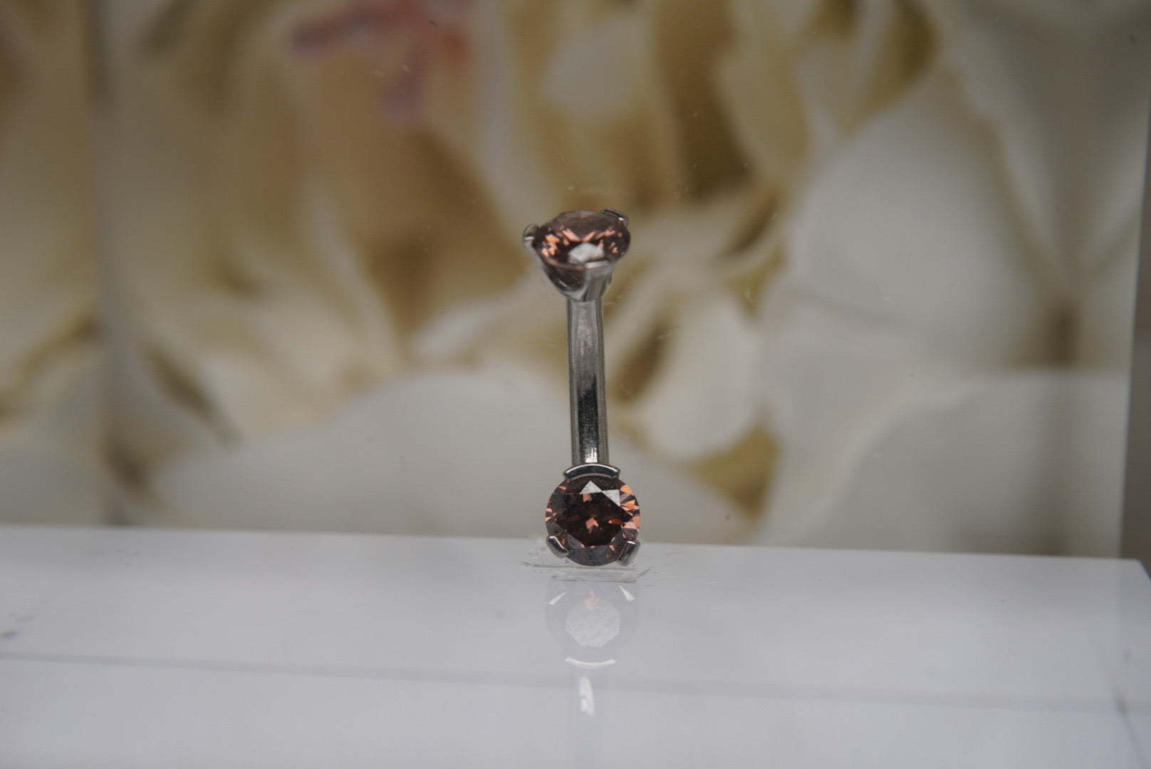 Brown Crystal Navel in a Prong Setting (4mm/4mm)