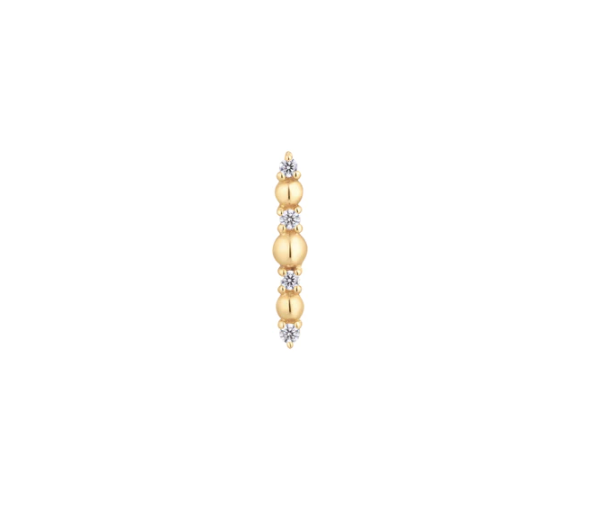 Stock image of Buddha Jewelry’s “Chance” in 14k yellow gold, showing its slim silhouette and alternating polished beads and crystals.