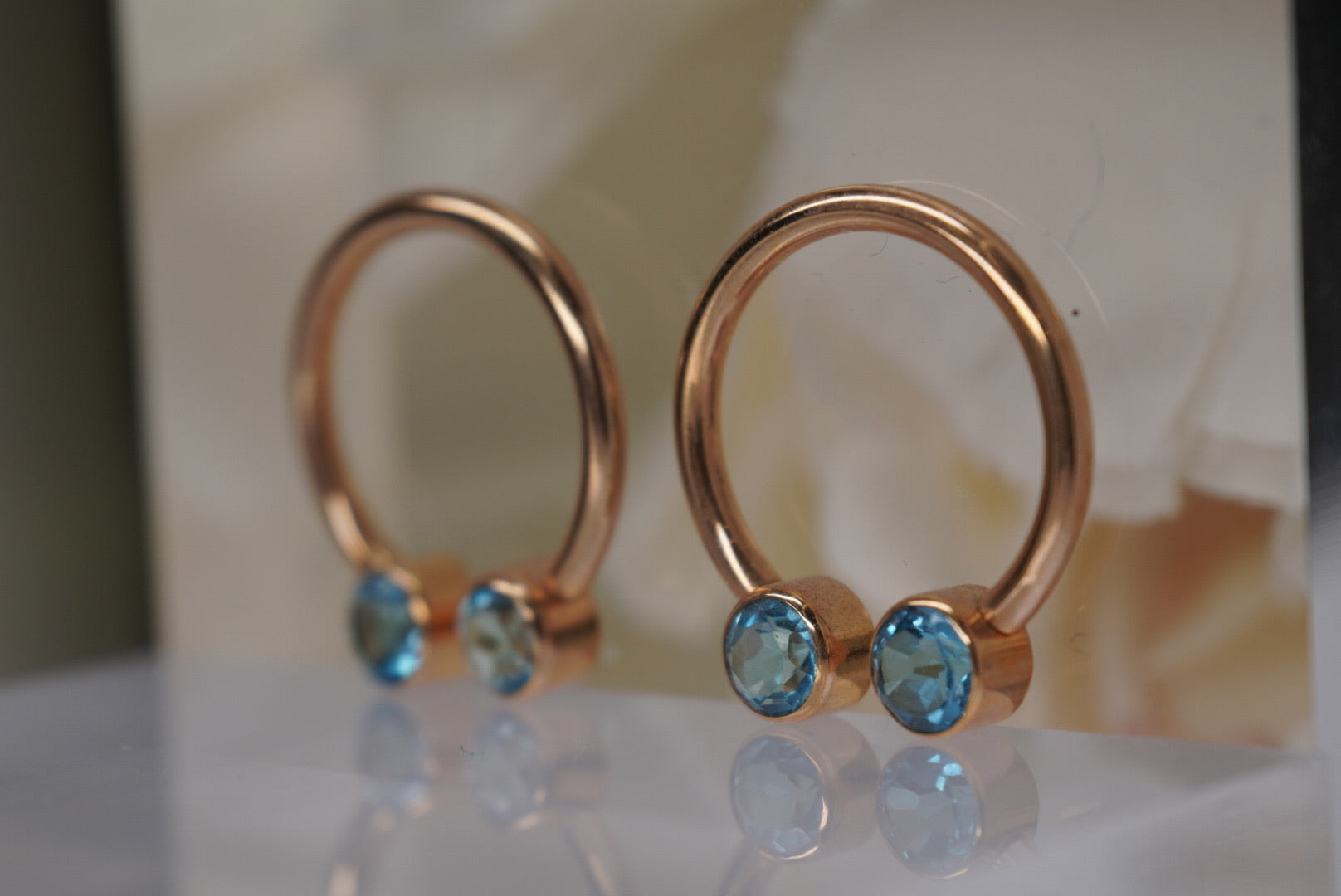 Pair of Circular Barbell in Yellow Gold with Blue Crystals- 14g 1/2"