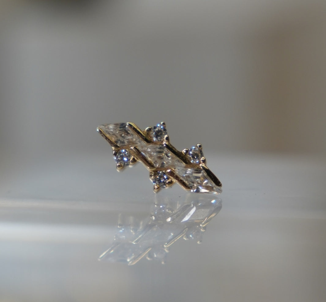 Side view of Limited Edition #138, showing the profile of its crystal settings.