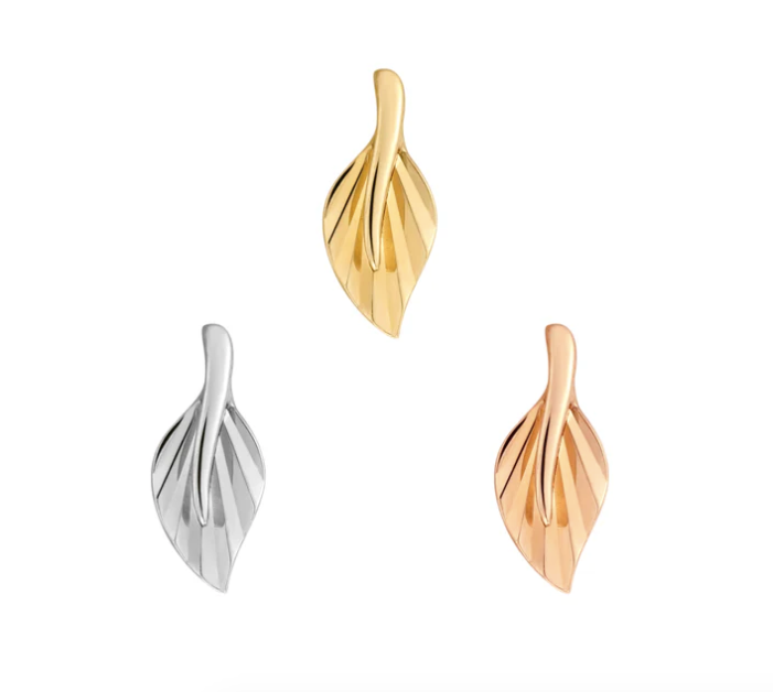 Stock image of Buddha Jewelry’s “Essence” in 14k yellow, white, and rose gold, featuring nature-inspired leaf designs with polished gold lines.