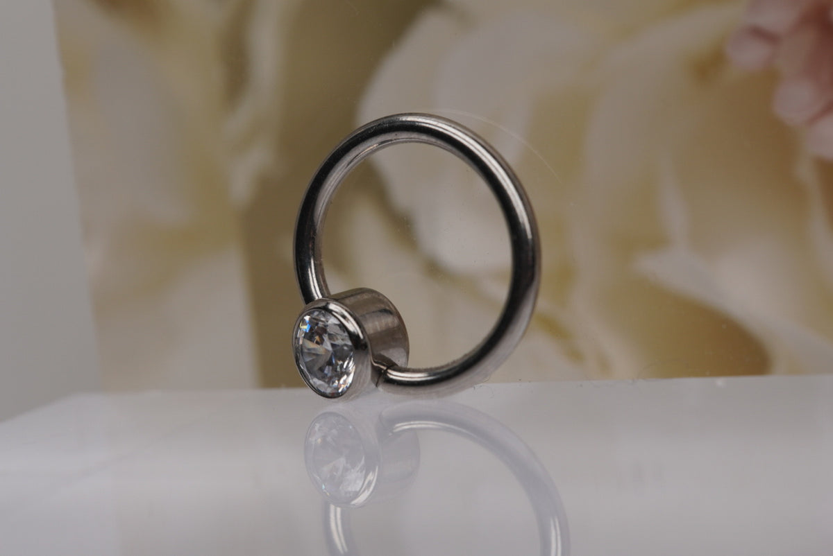 Captive Bead with White Crystals