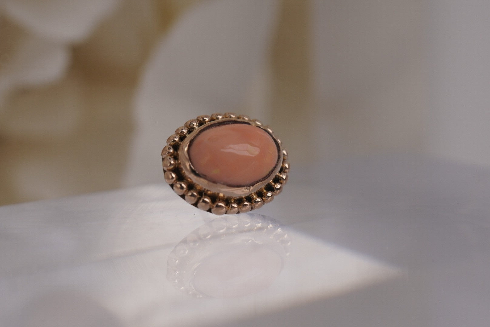 Oval Coral with Gold Beading