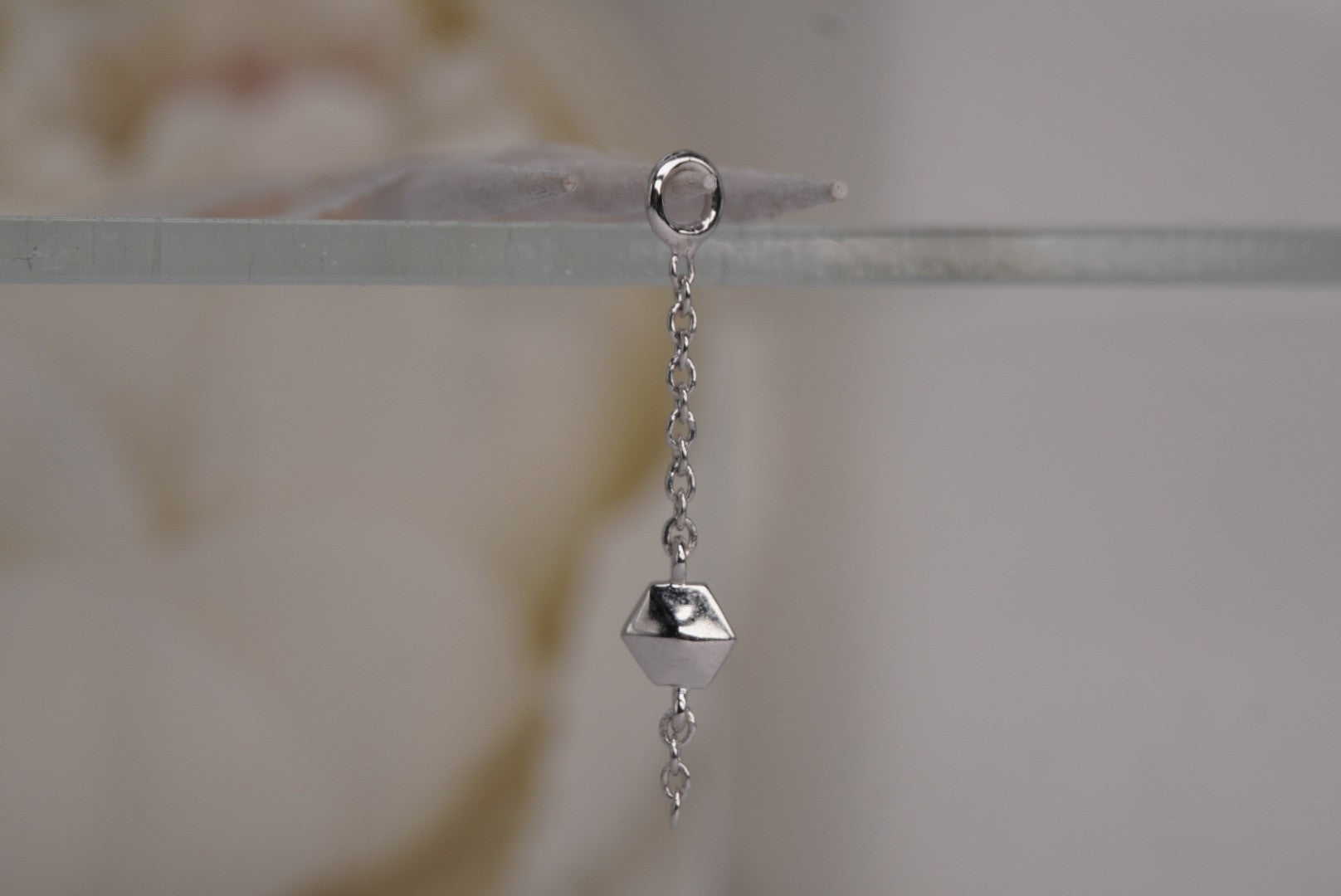Hex Stud Orbit Charm