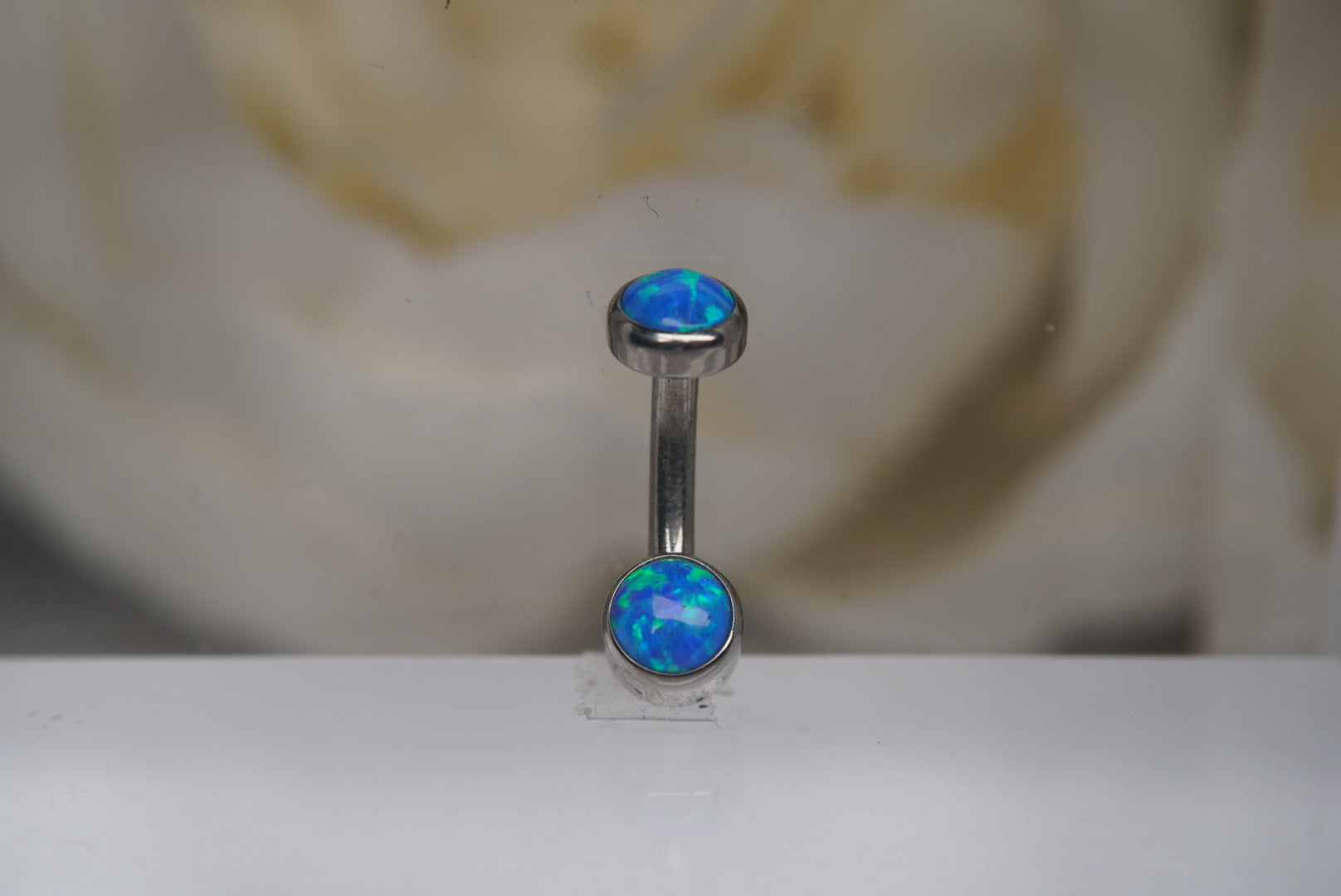 Capri Blue Opal Navel in a Bezel Setting (4mm/4mm)