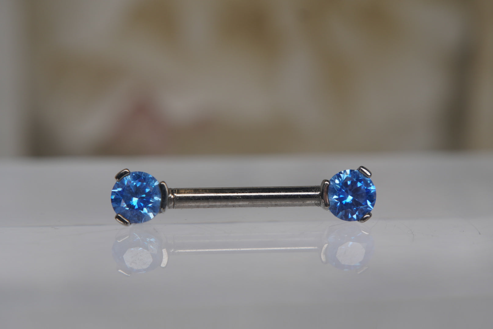 Arctic Blue Crystal Prong Nipple Barbell in 14g