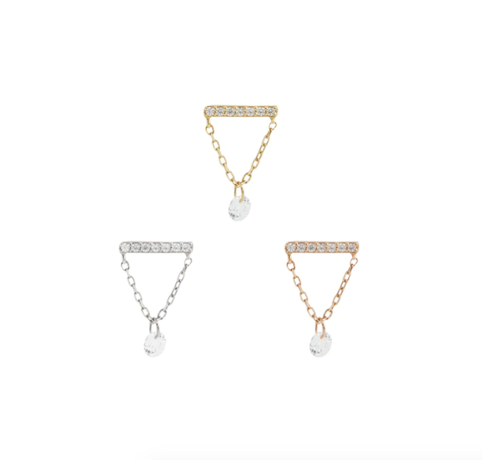 Stock image of Buddha Jewelry’s “Dolce” dangles in 14k yellow, white, and rose gold, featuring crystal-lined bars with fine chains and single drops.