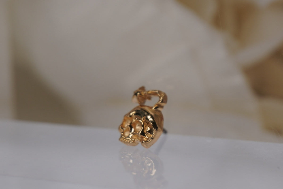 18k gold Skull Bomb industrial strength angled view