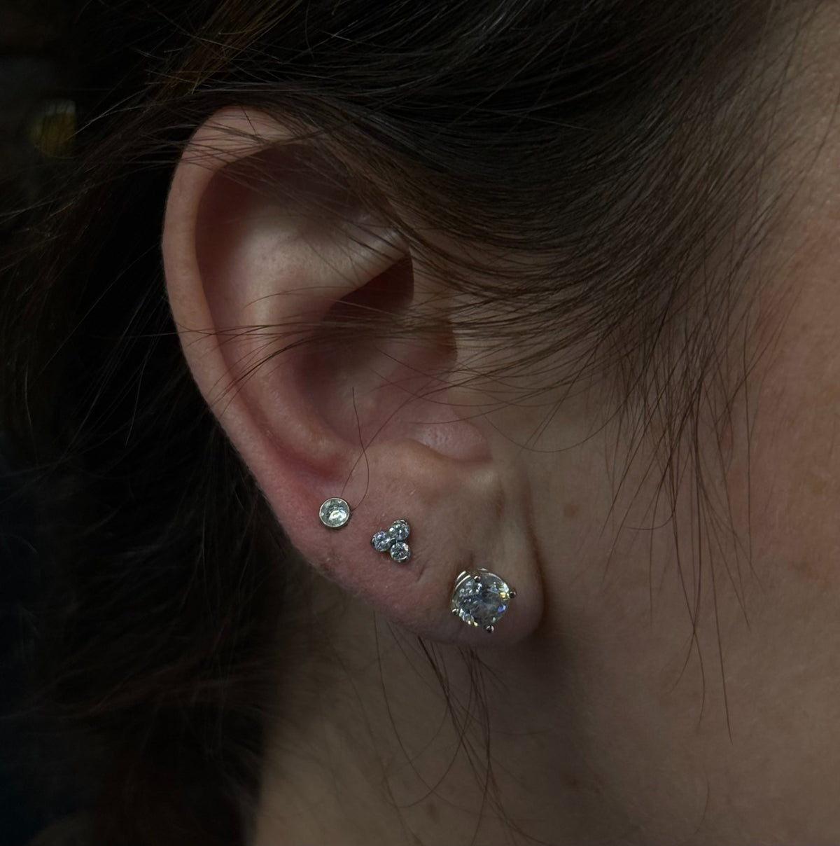 industrial strength trinity 3 white crystals earlobe piercing