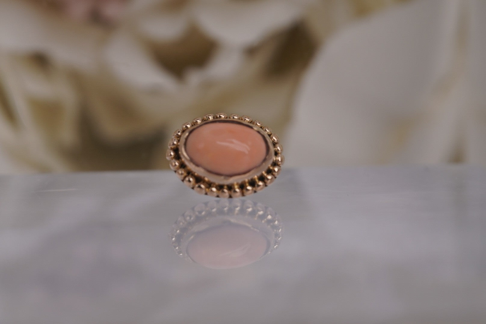 Oval Coral with Gold Beading