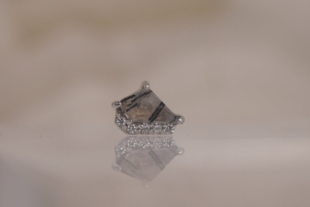 Front view of Buddha Jewelry’s “Elevate” in 14k white gold, featuring tourmalated quartz with smoky dark inclusions and delicate crystal accents.