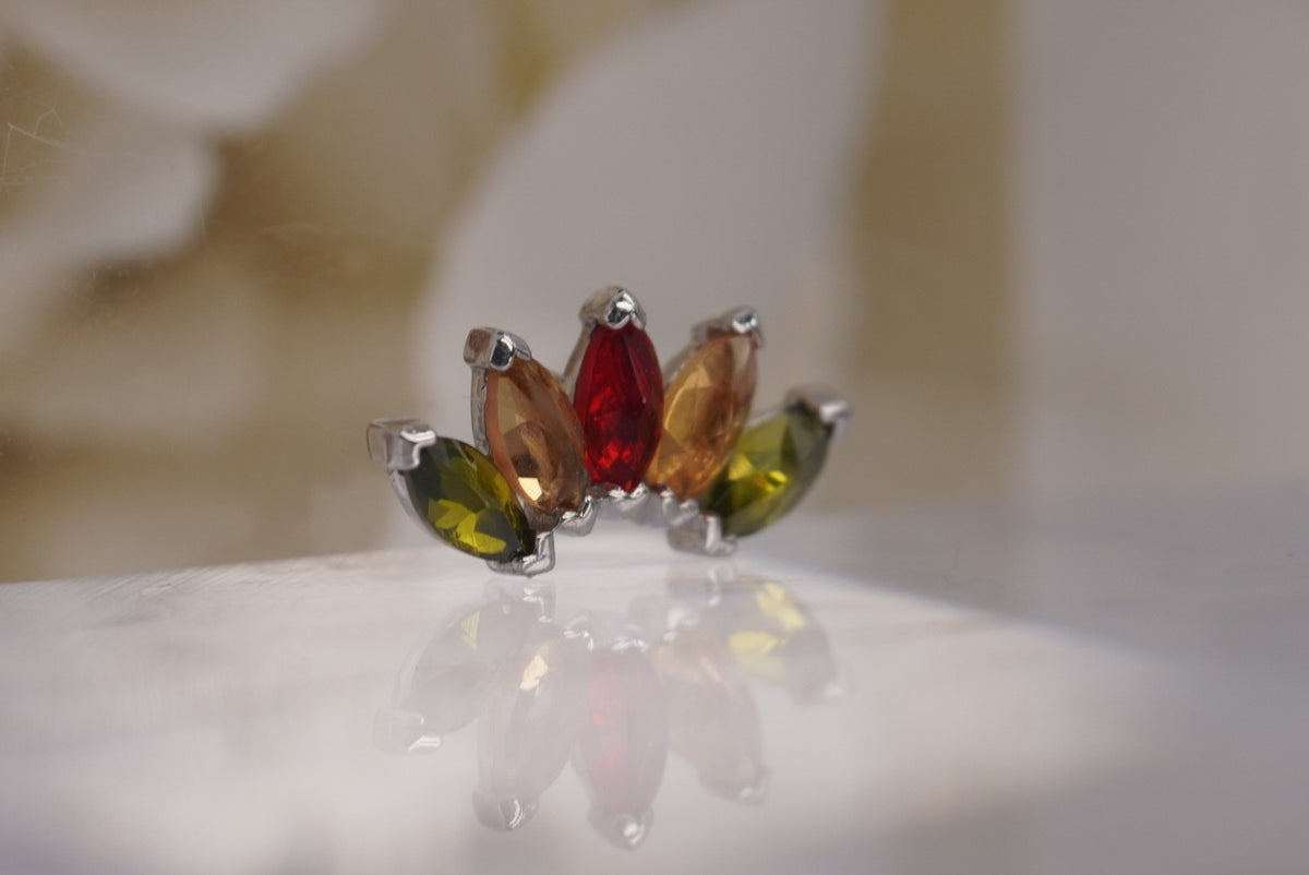 Angled Photo of threadless Tawapa 14k WHITE GOLD "Bella" with 6x12mm with (5) 2x4mm Marquis Cut Gemstones in Red, Green, and Amber Crystals showing brilliance and details
