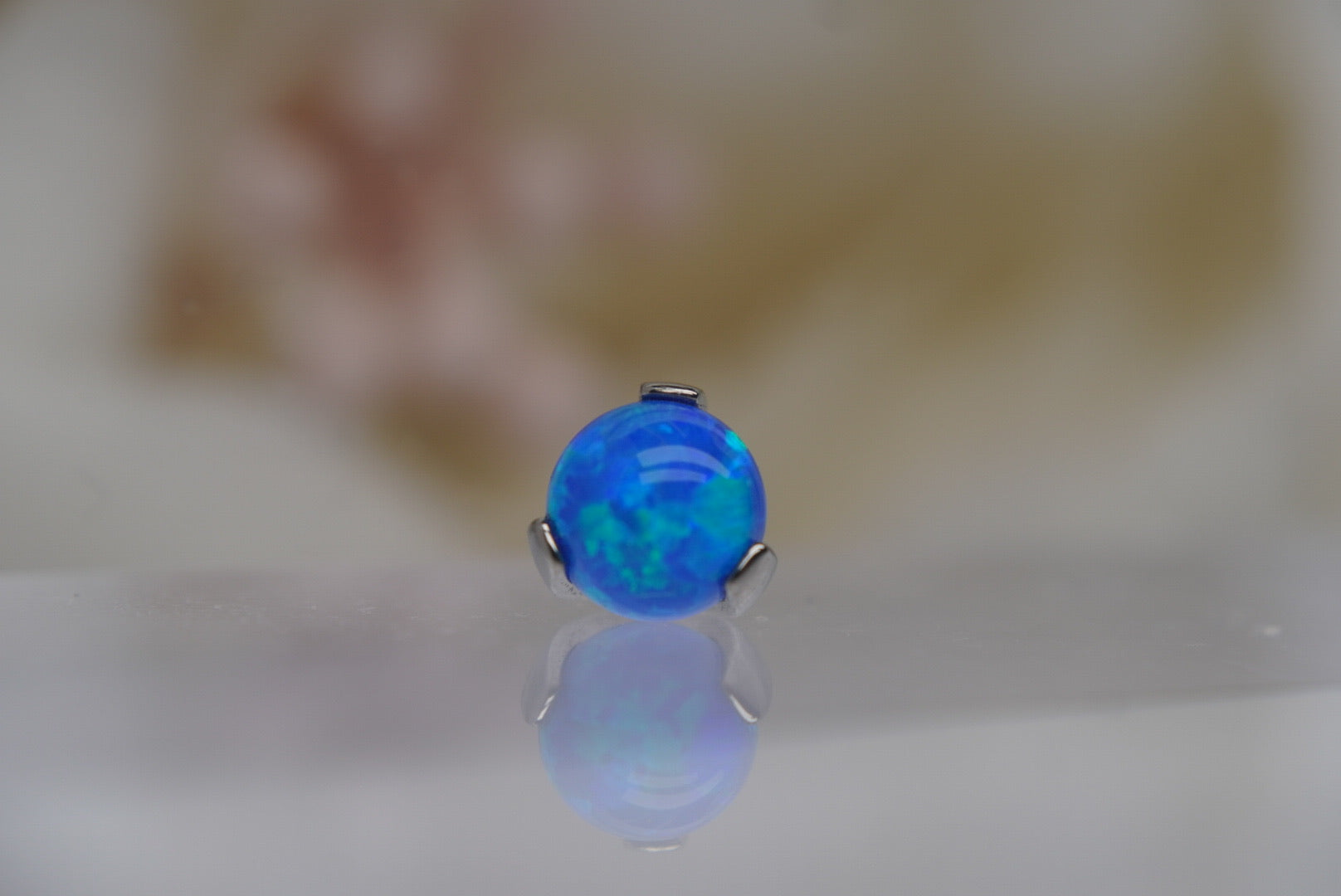 Capri Blue Opal Prong Setting- 12/14g