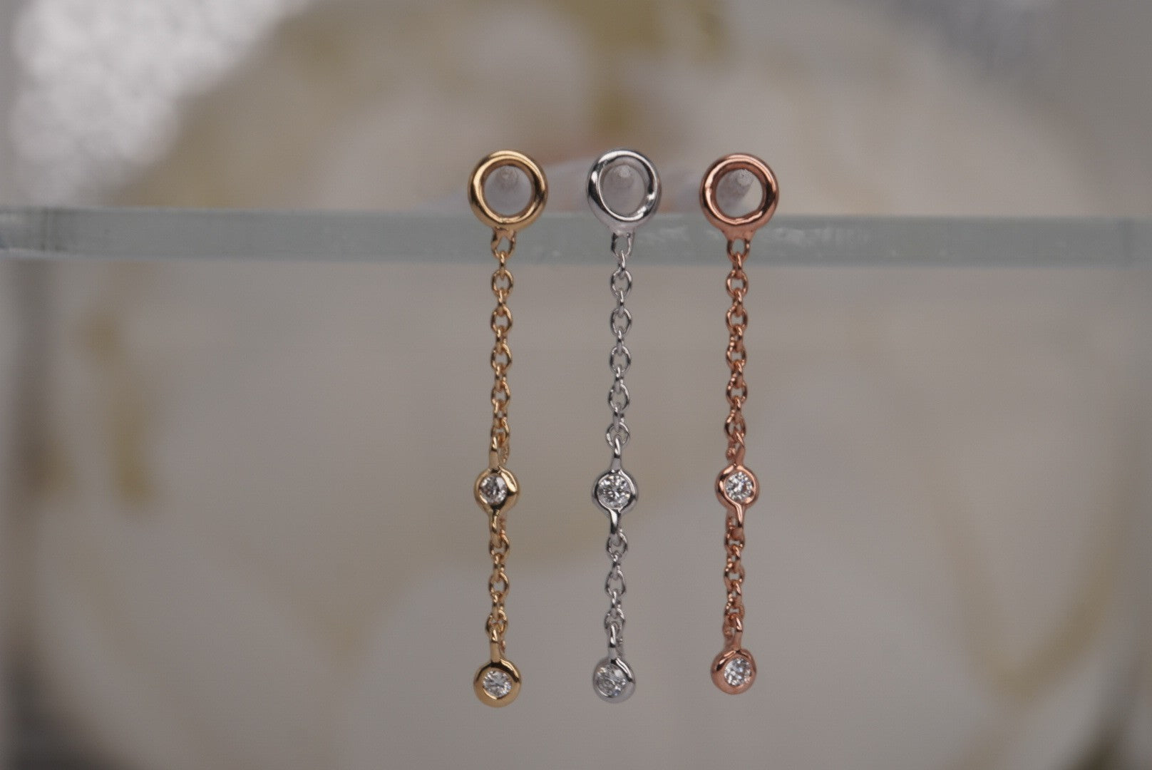 Gemmed Orbit Charm with Diamonds
