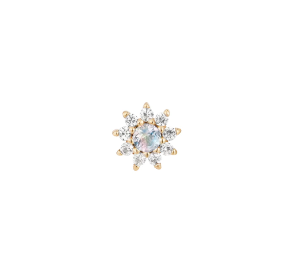 Stock image of Buddha Jewelry’s “Eloise” in 14k yellow gold, showing its iridescent moonstone center and delicate white sapphire petals.