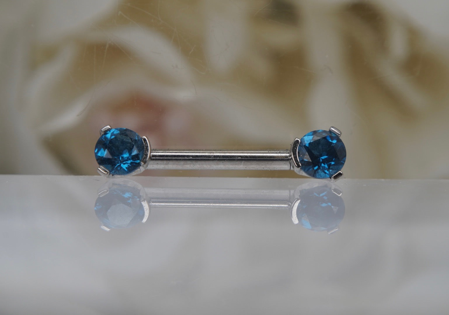 London Blue Crystal Prong Nipple Barbell in 14g