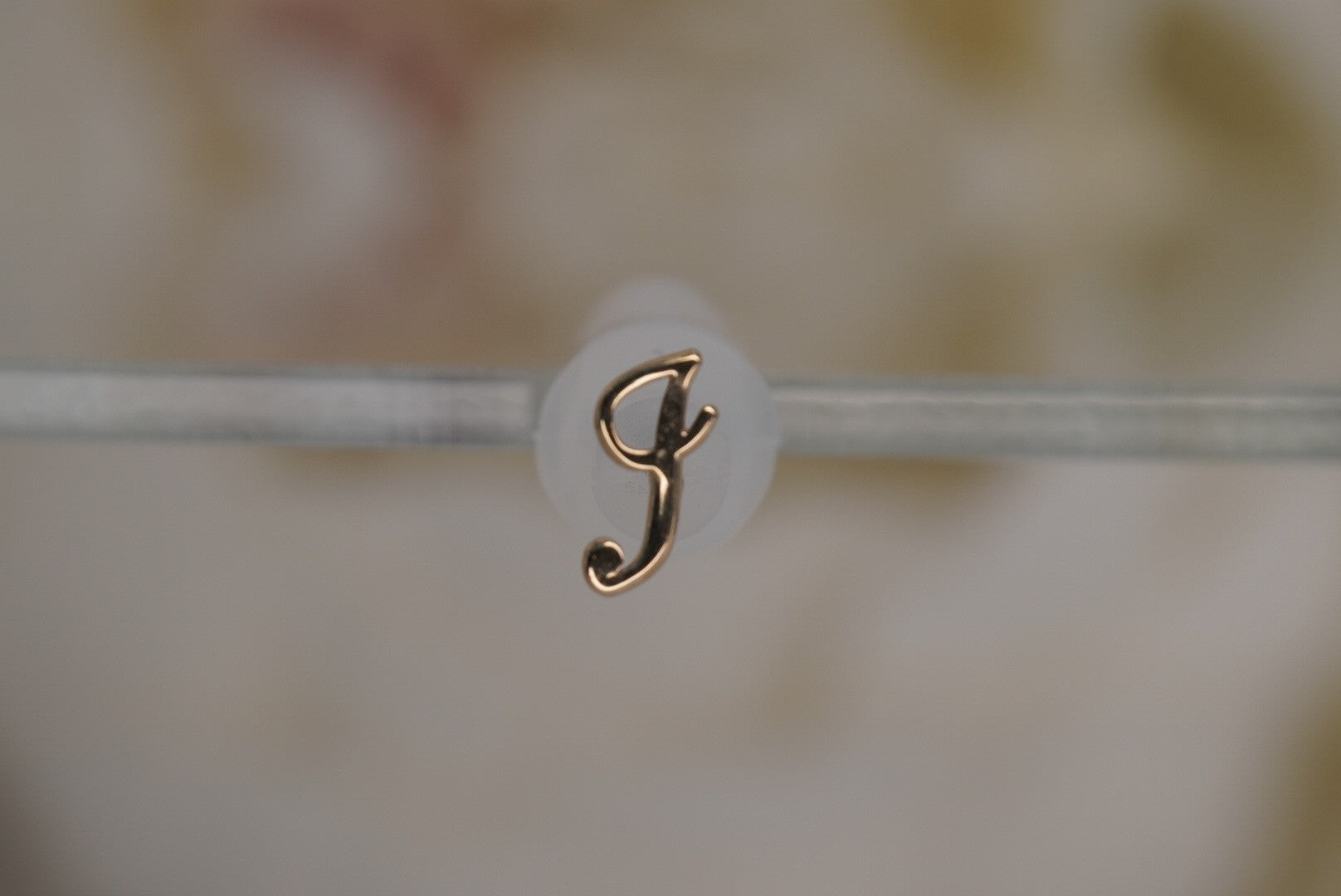 Initial J
