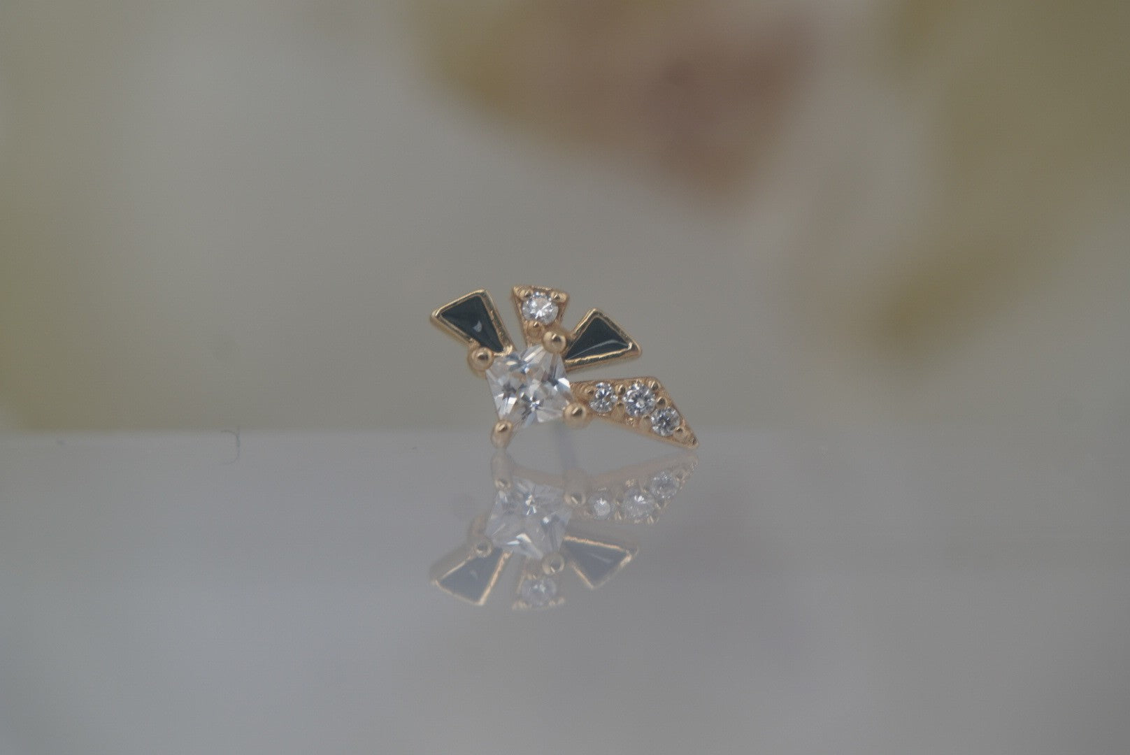 Powerhouse | Buddha Jewelry | 14k Gold White Crystal & Black Enamel Threadless Piercing Jewelry