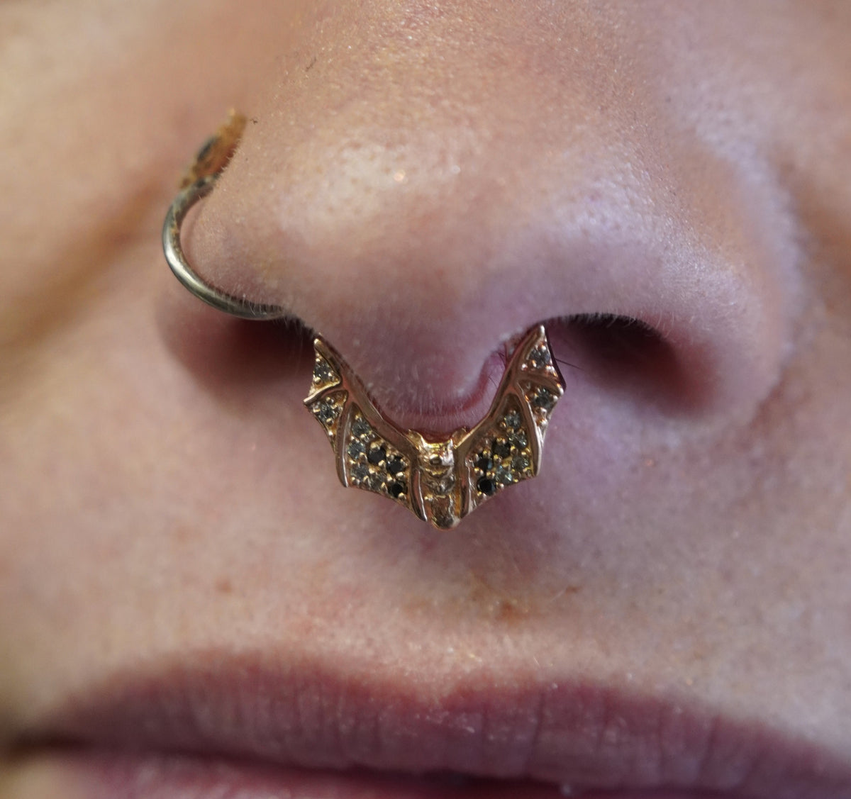 Lilith Bat Clicker with Graduating Diamonds & Sapphires septum piercing