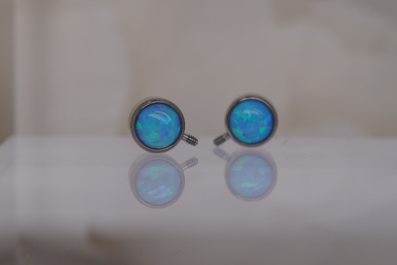 Side Facing 14g Bezel-set Opals