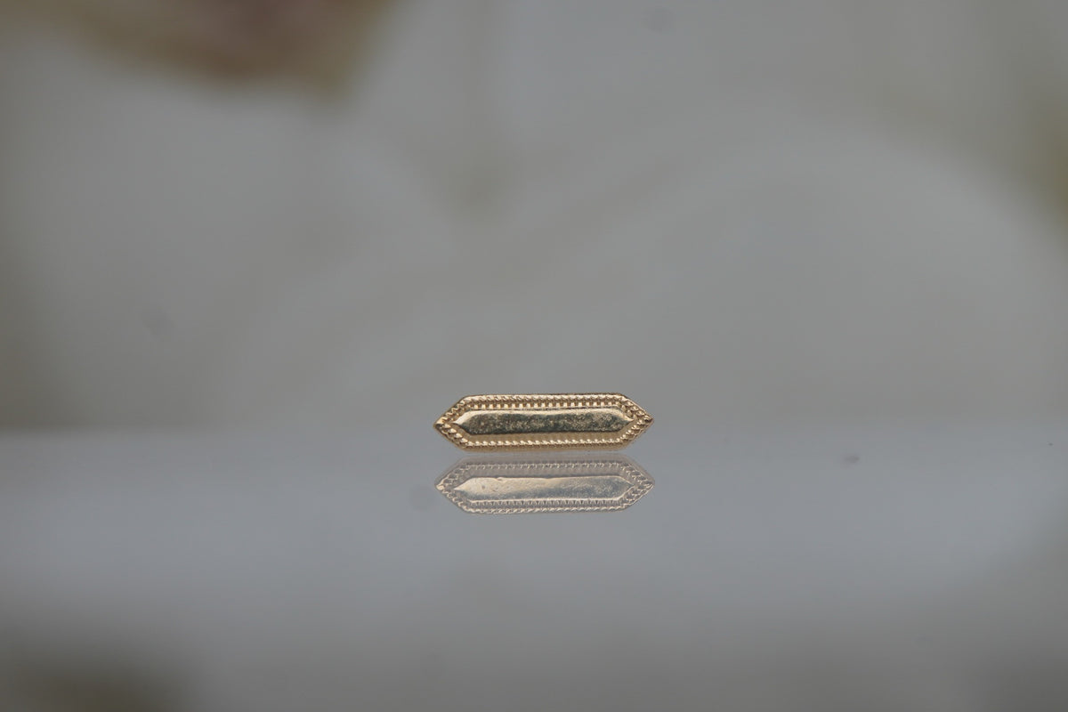 Angled view showing the texture along the bar’s edges.