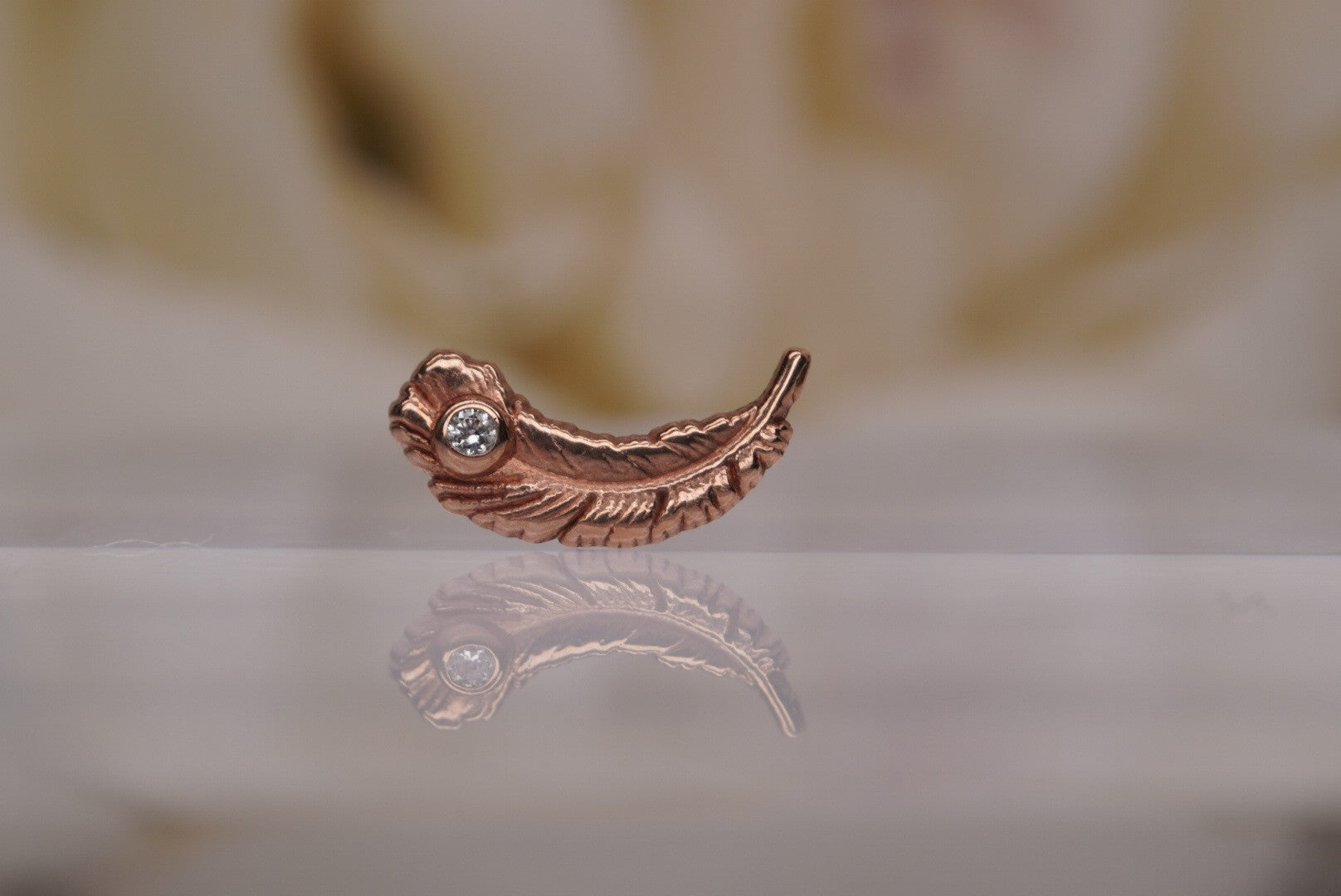 Feather with Gem in Gold
