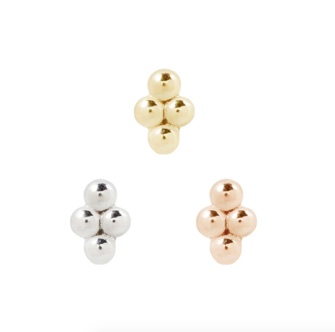 Stock image of Buddha Jewelry’s “4 Bead Cluster” in 14k yellow, white, and rose gold, featuring four-bead diamond-shaped designs.