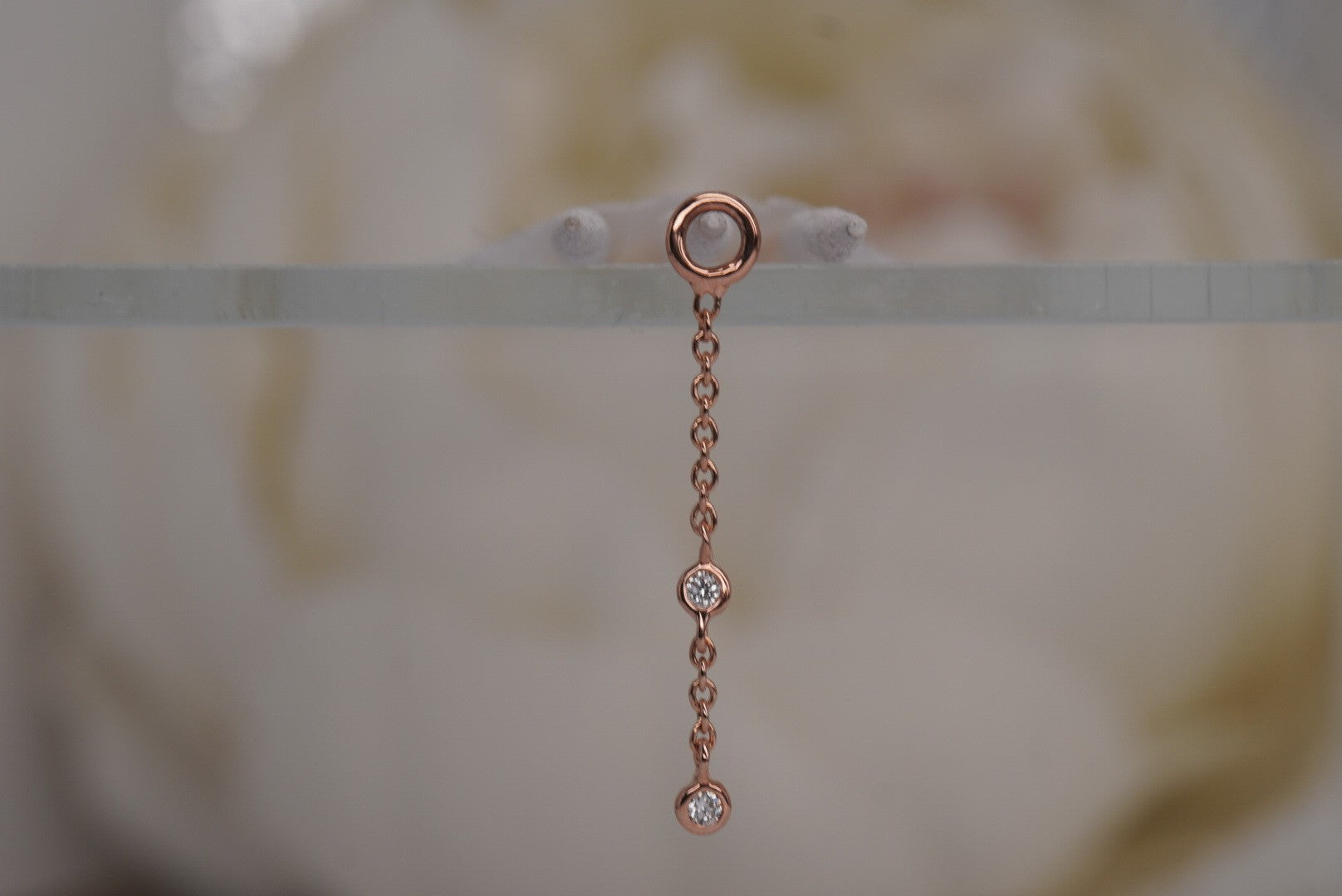 Gemmed Orbit Charm with Diamonds