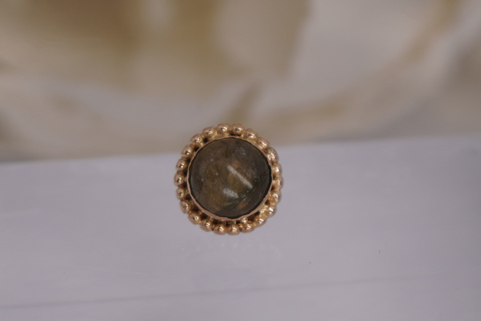 Round Bezel Set Stone with Gold Beading