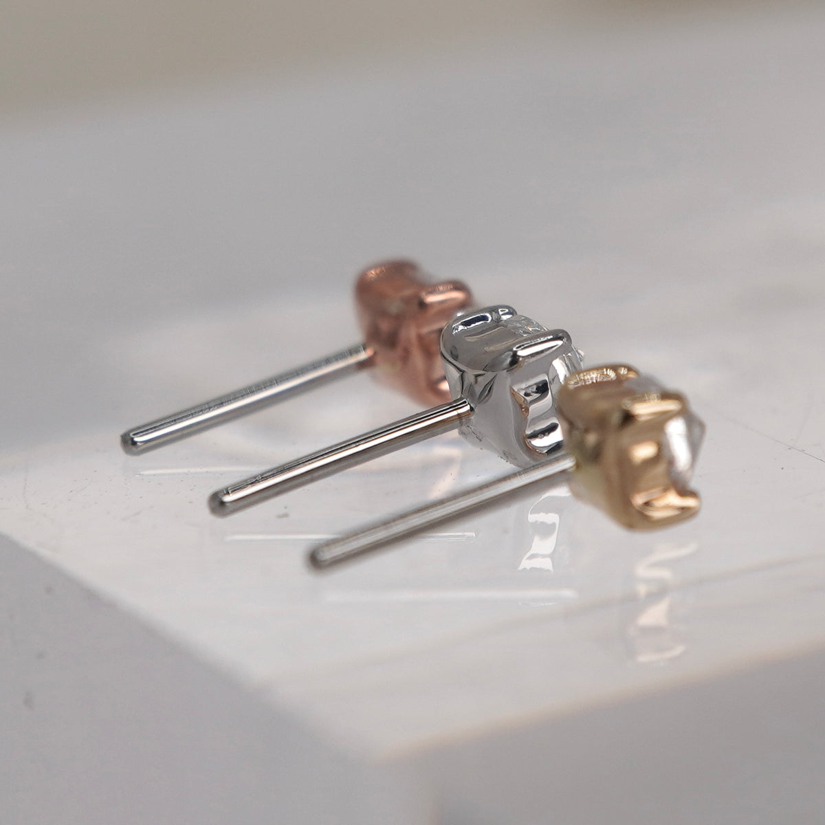 Buddha Jewelry reverse prong gem 14k solid gold white crystal prong threadless  yellow gold white gold rose gold group back view showing threadless pin