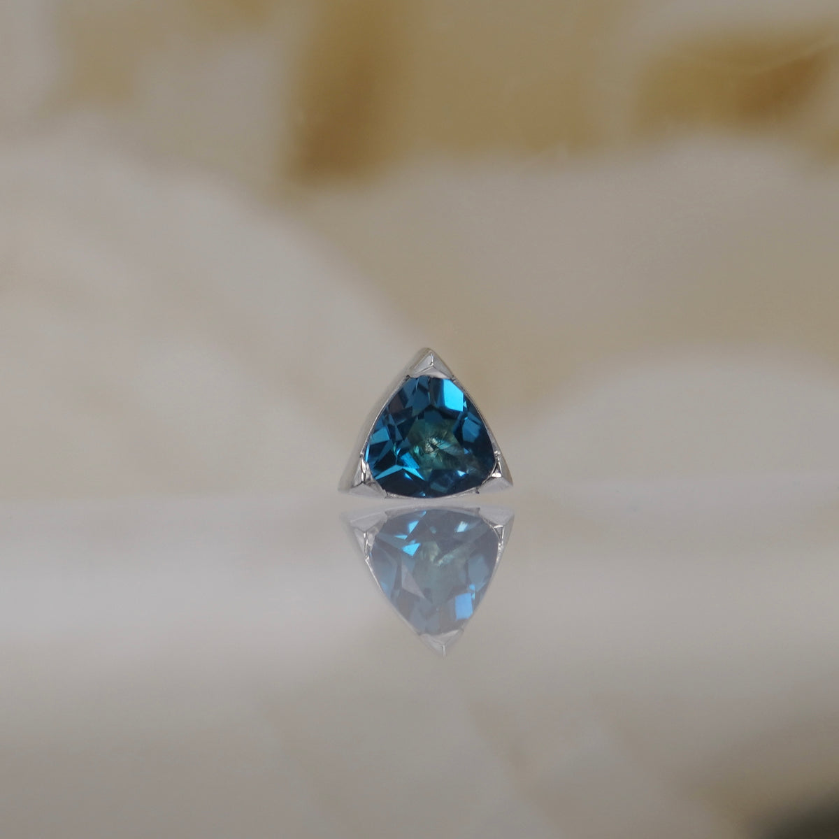 Tether 14k Gold Lennox with London blue topaz trillion threadless white gold 