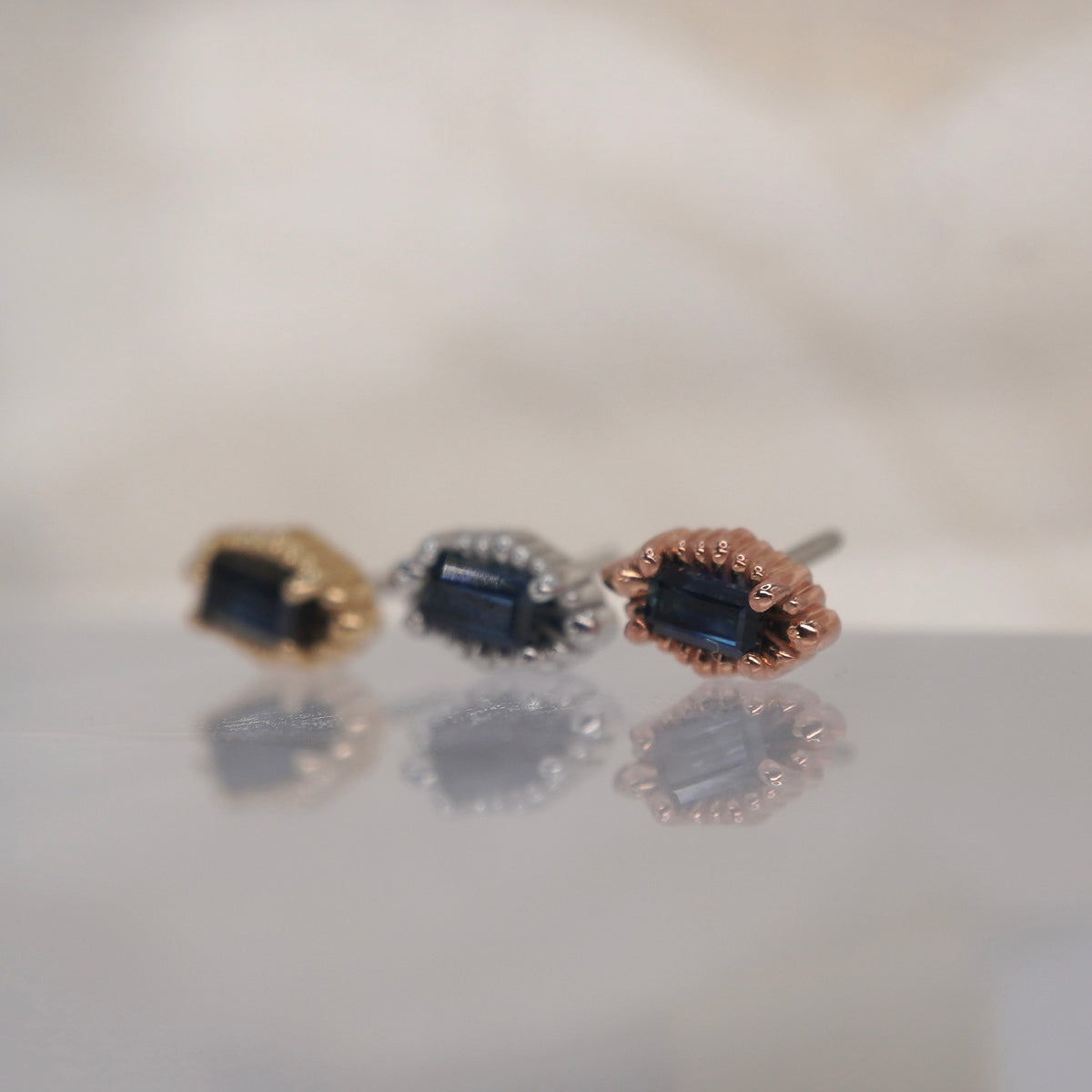 Tether 14k gold Melange Baguette with london blue topaz in yellow gold white gold rose gold group shot side view showing detail and threadless pin