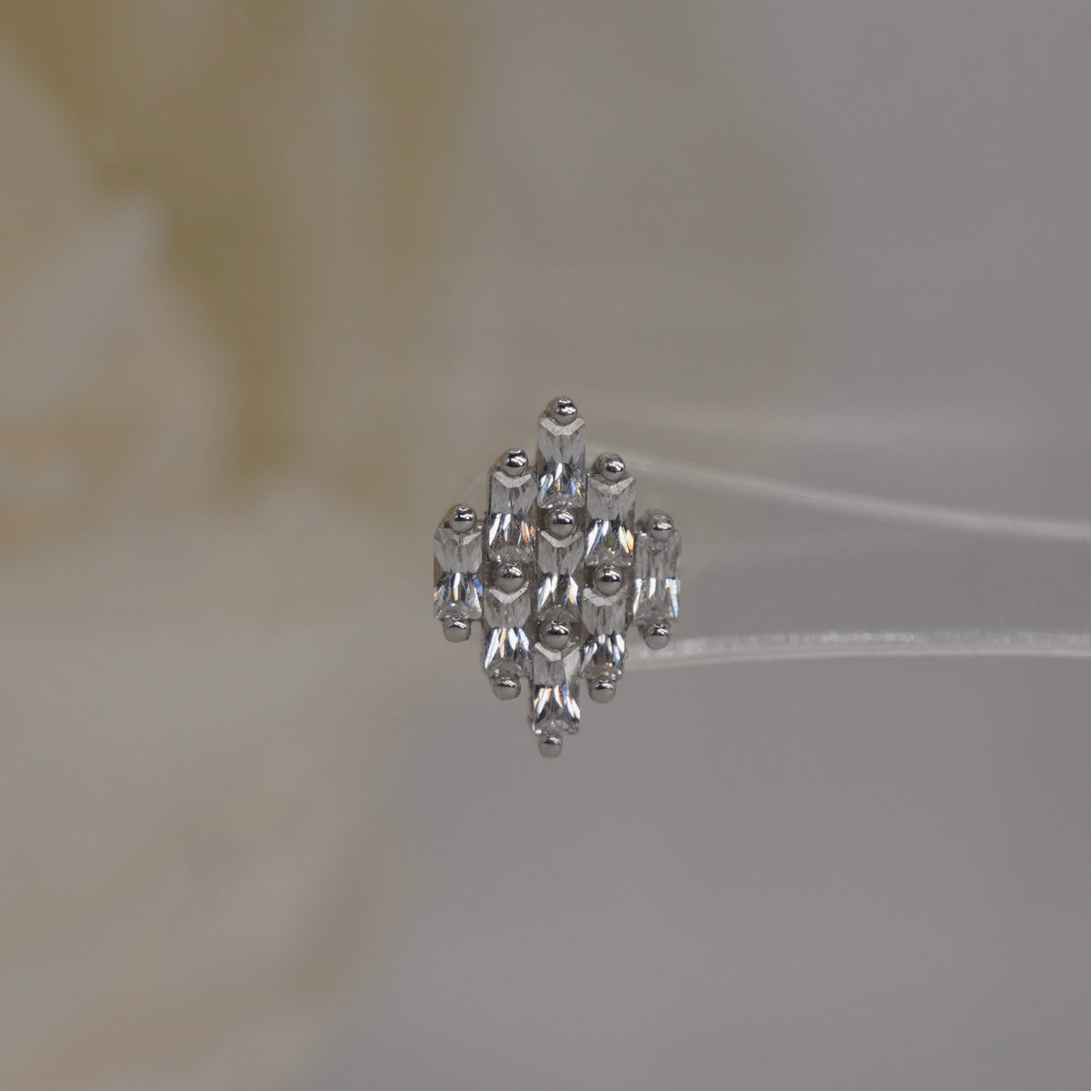 Front view of Buddha Jewelry’s “Wonder” in 14k white gold, featuring elongated crystals in a softly spreading fan.