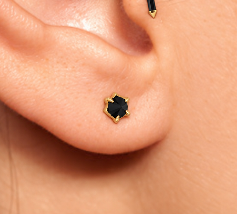 Limited Edition 266 The Black Spinel Threadless End worn in a piercing
