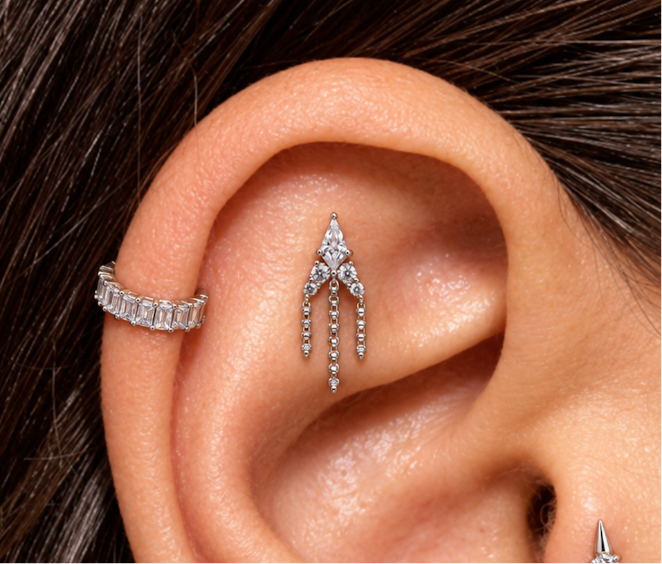 Holy smokes in 14k white gold worn in a helix piercing