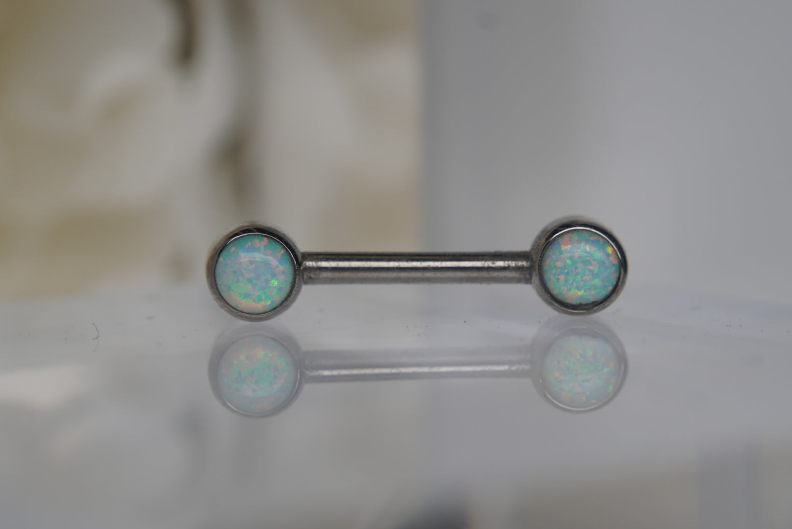 White Opal Bezel Nipple Barbell in 12g