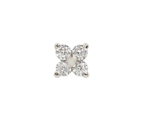 Stock image of Buddha Jewelry’s “Corazon” in 14k white gold, showing its four sparkling crystals and central heart accent.