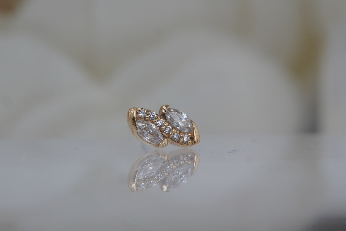 Angled view of Limited Edition #125, showing the double marquis shape and crystal setting.