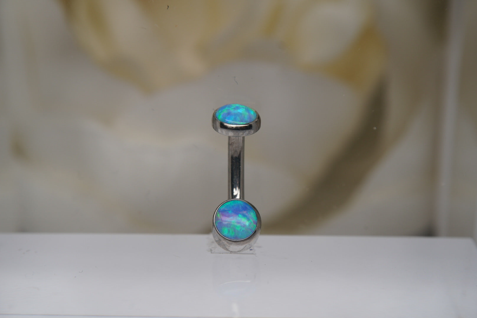 Sky Blue Opal Navel in a Bezel Setting  (4mm/4mm)