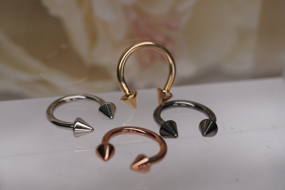 Body gems 14g Circular Barbell in Gold with Spikes