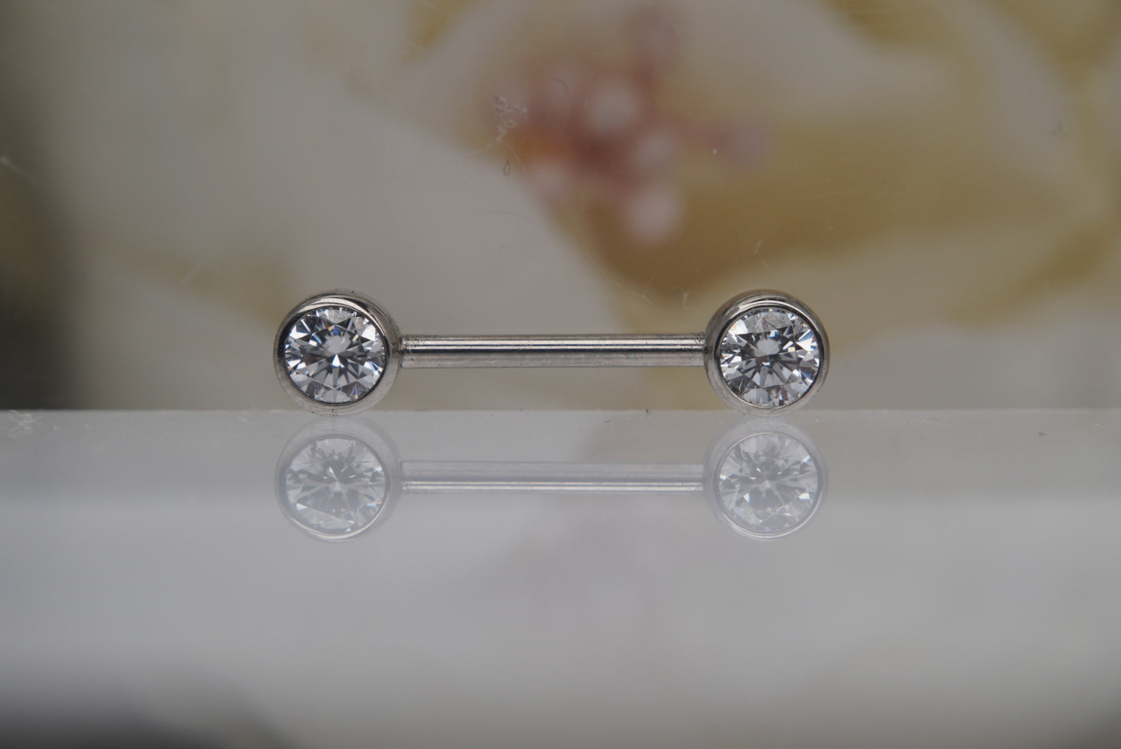 White Crystal Bezel Nipple Barbell in 12g