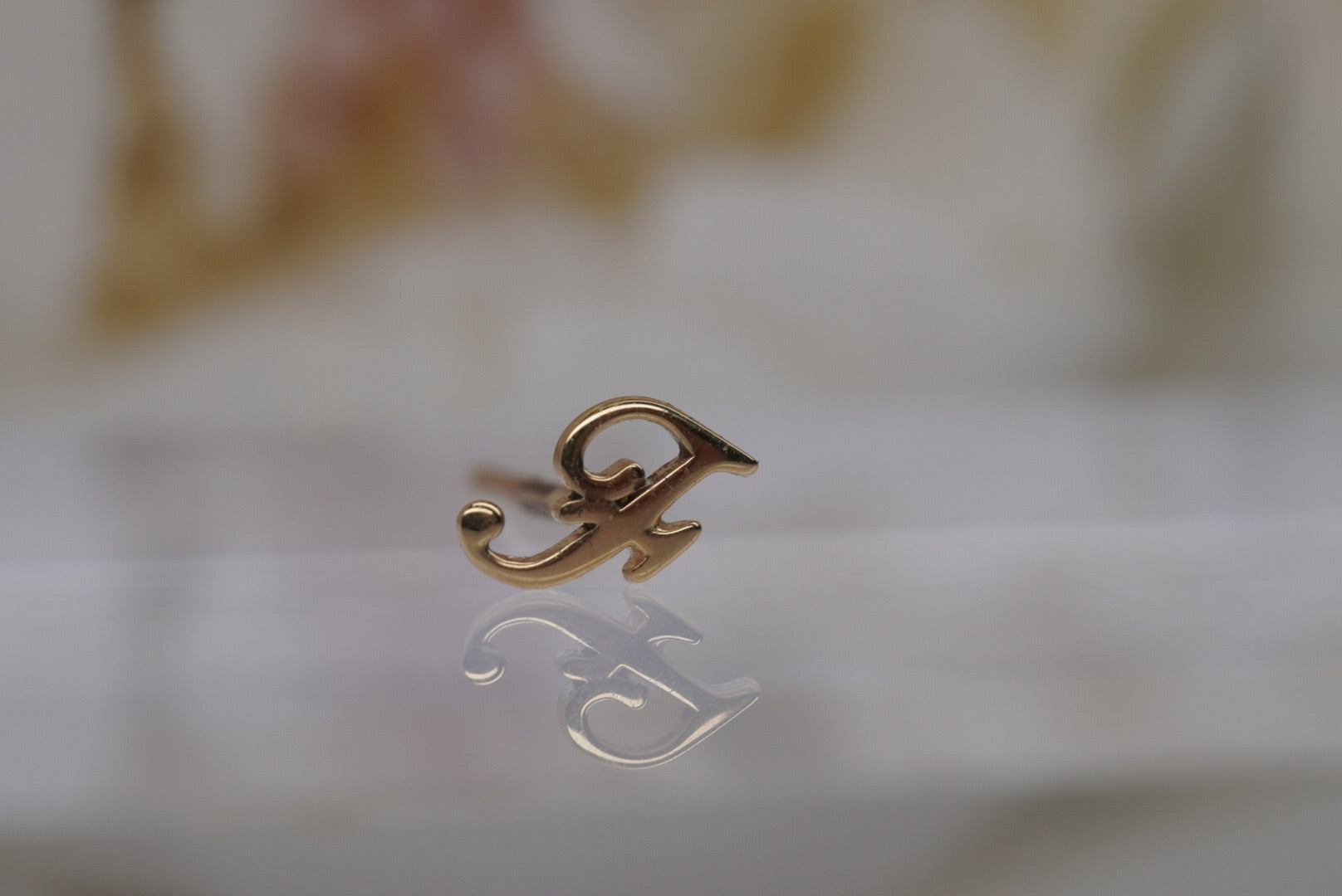 Letter "F" Nostril Screw in Yellow Gold
