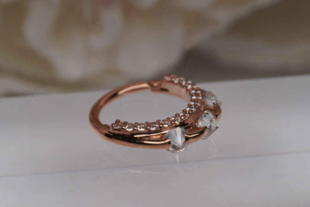Photo of 14k Rose Gold 16g 3/8" "Gayana" clicker, side view