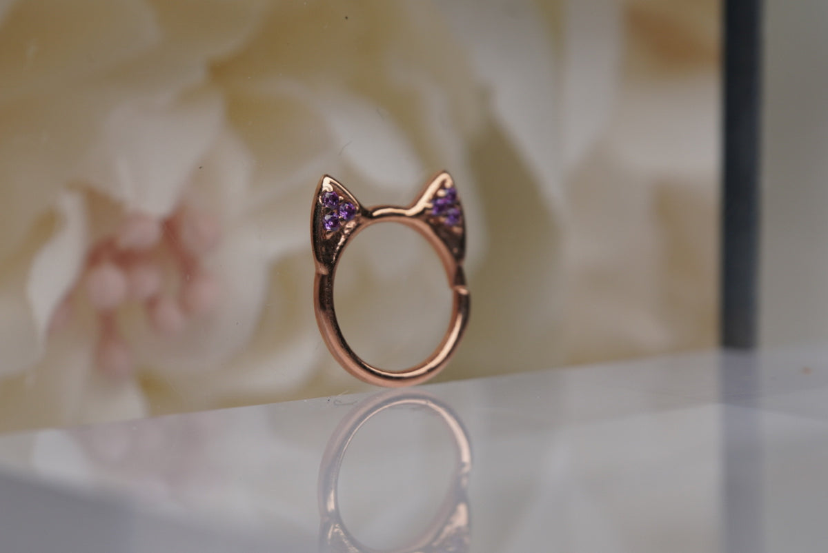 Meow Ring in Rose Gold with Purple Crystals angled view