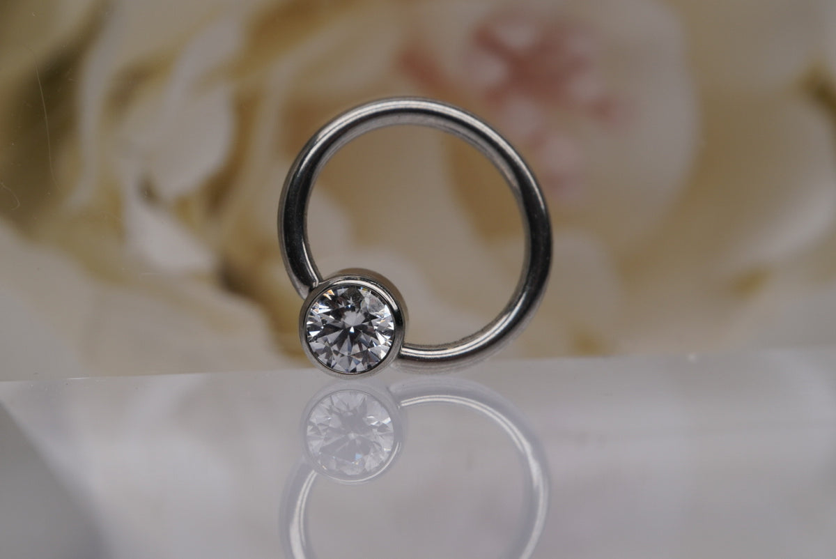 Captive Bead with White Crystals