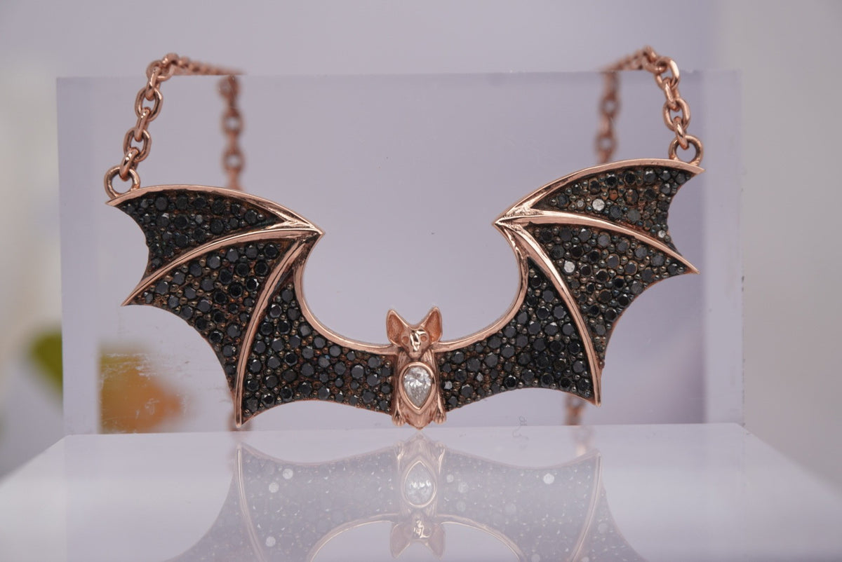 Photo of Sid the Bat Necklace with Genuine Black and White Diamonds Rose Gold