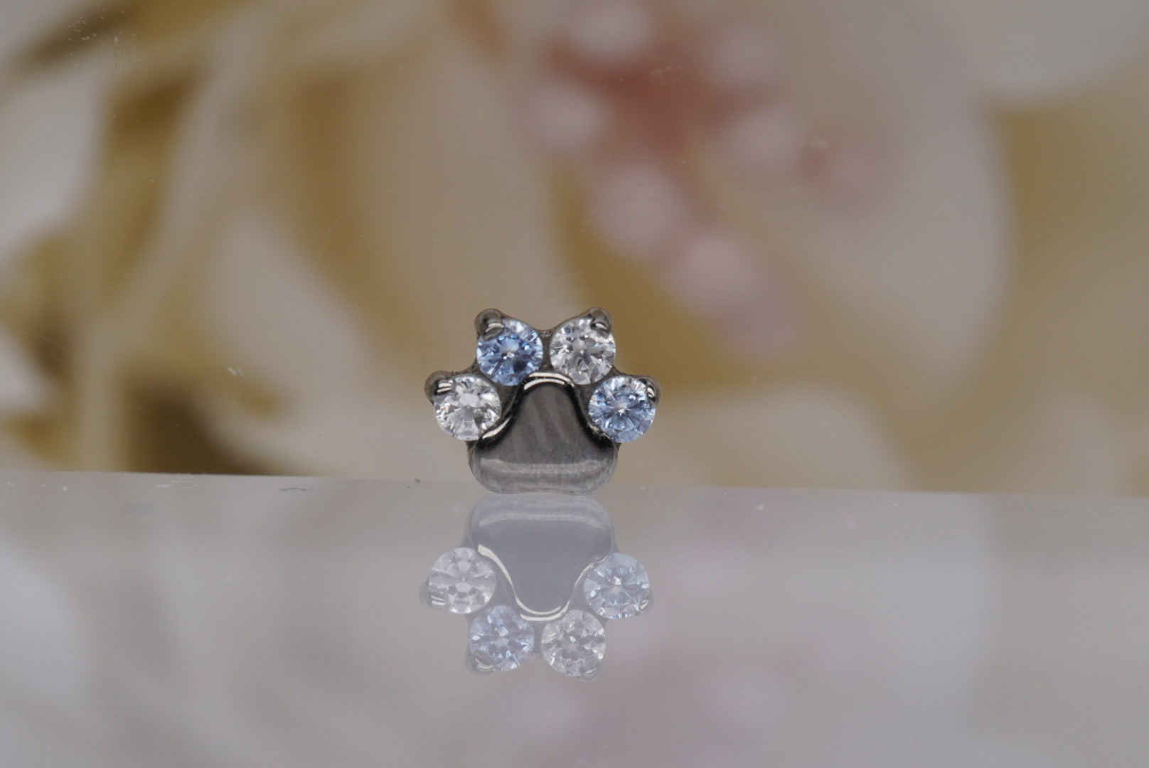 Paw Print with Light Blue & White Swarovski Crystals- 12/14g