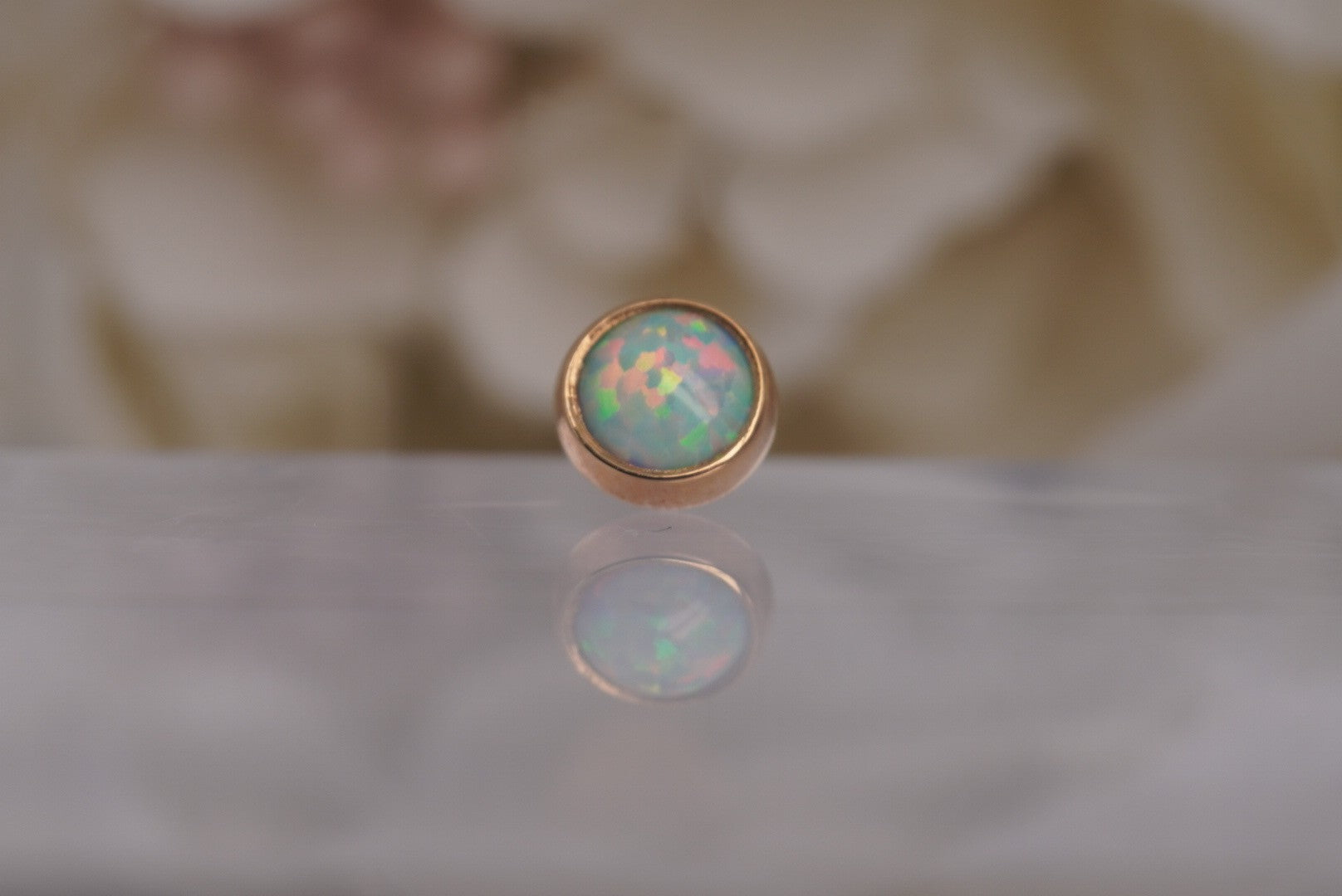 White Opal in Yellow Gold